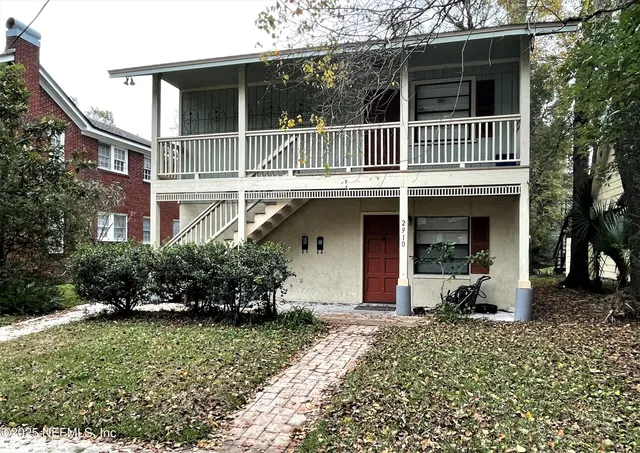 a house view with a garden space
