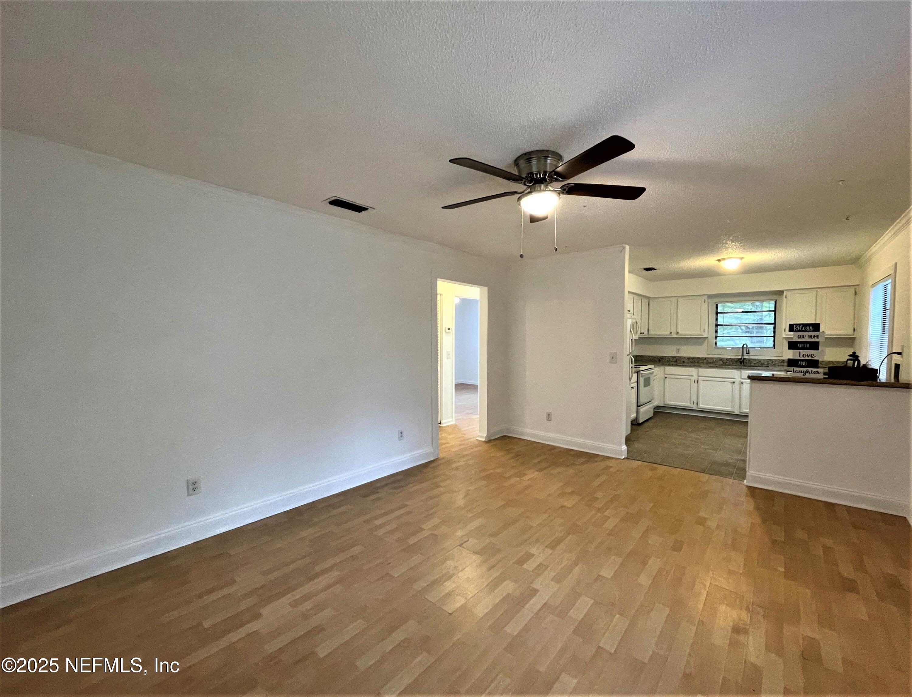 2910 Post Street Jacksonville, FL 32205 - Photo 5 of 12 a view of a kitchen with a sink and a stove