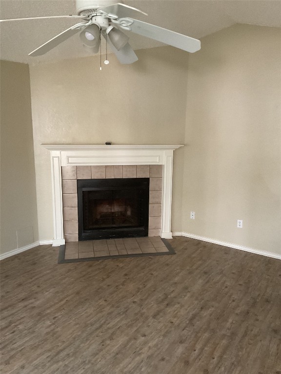 383 Fantail Loop Austin, TX 78734 - Photo 2 of 7 a view of an empty room with wooden floor fireplace and a window
