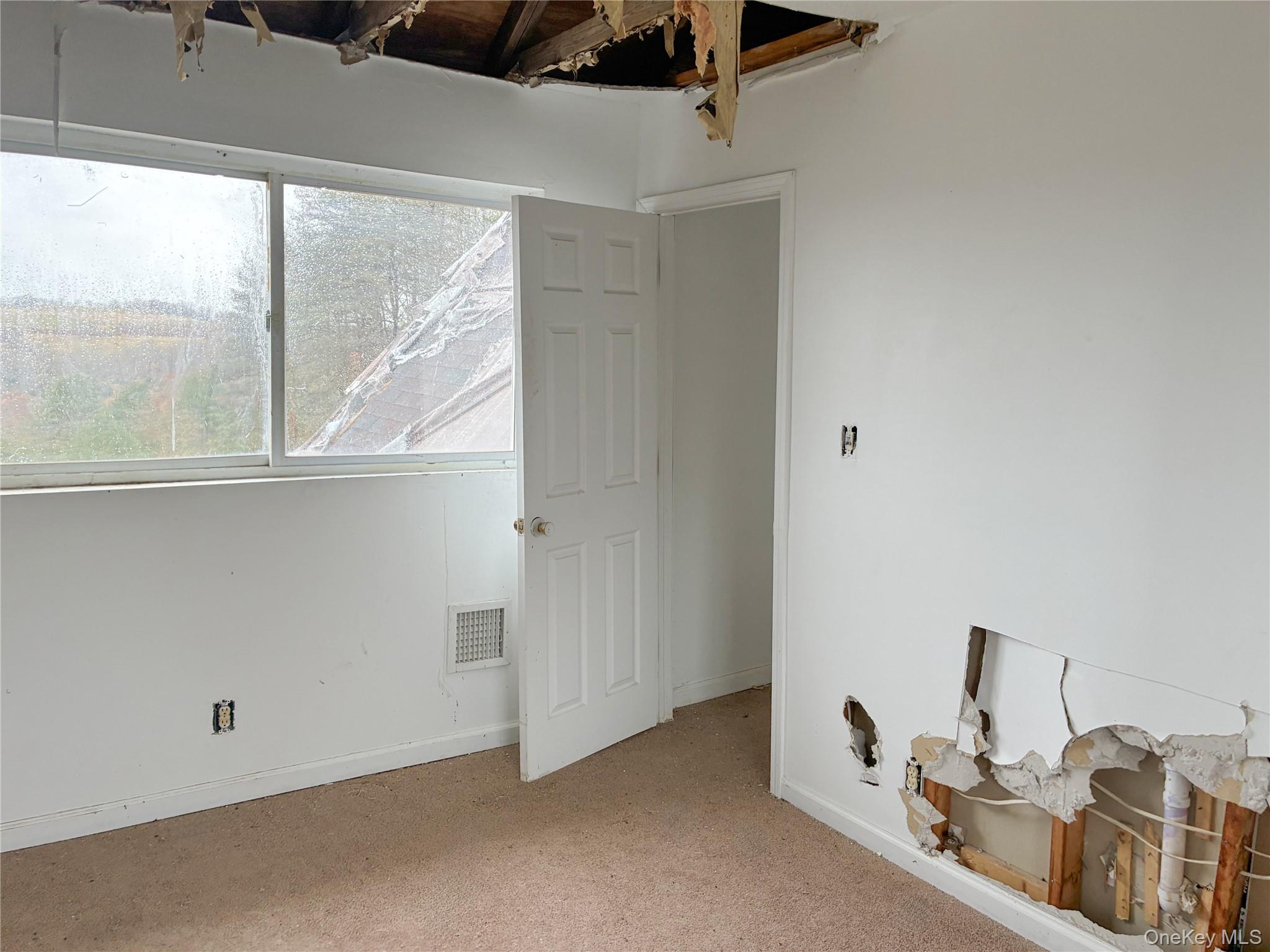 938 Horseshoe Lake Road Swan Lake, NY 12783 - Photo 8 of 8 a room with a window