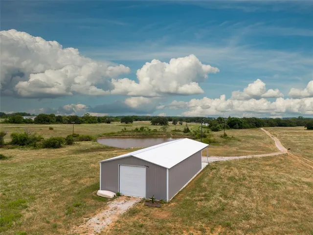 a view of a terrace with a lake view