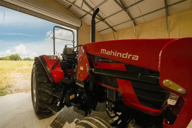 a view of a golf course with an ocean view