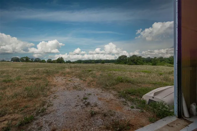 a view of swimming pool with a garden