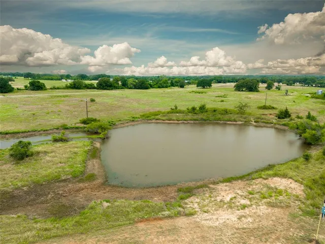 a view of a lake from a yard