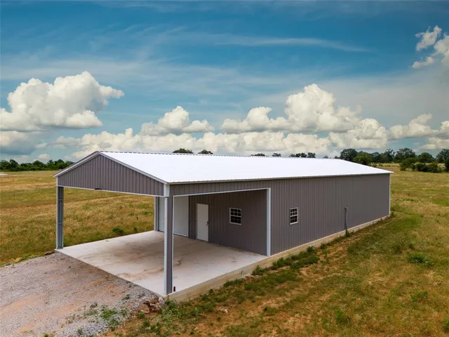a view of a room with porch and wooden floor