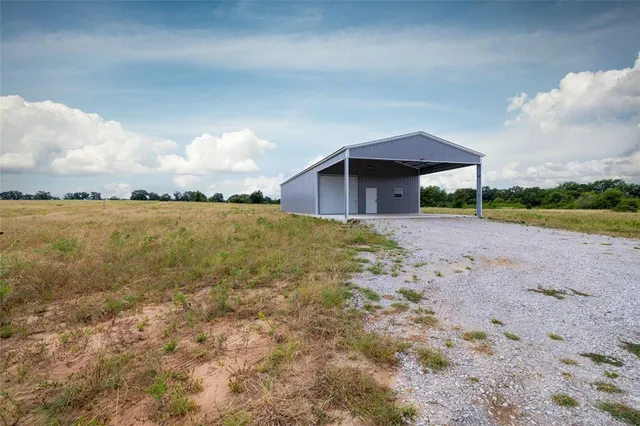 a kitchen with stainless steel appliances a refrigerator and a stove