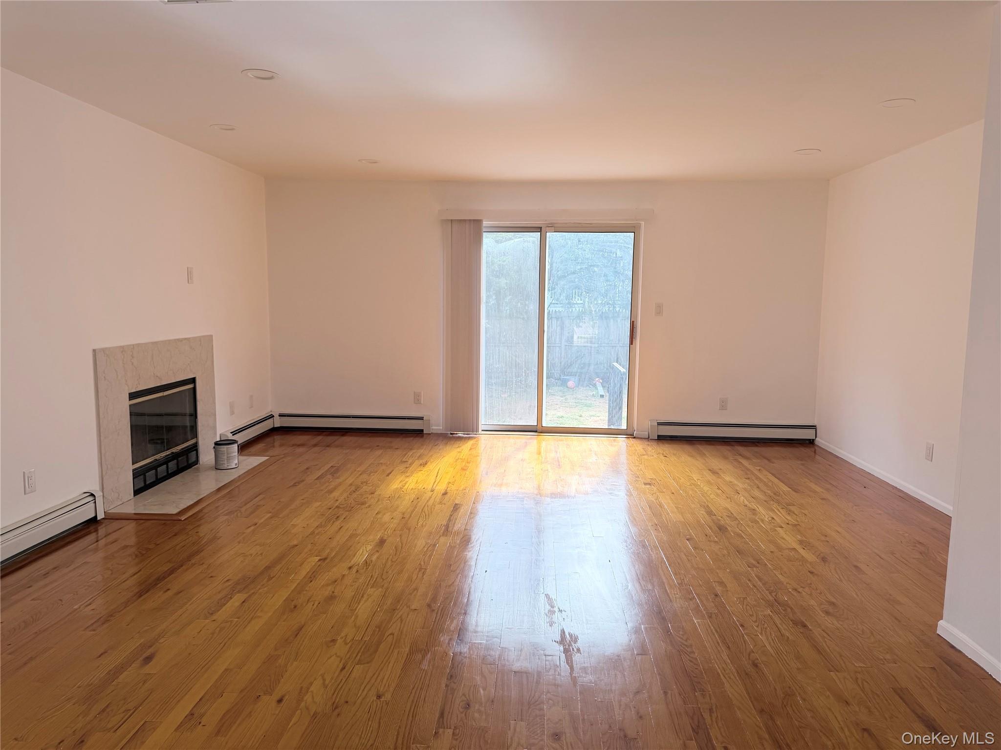 62 Hickory Road, Unit B Port Washington, NY 11050 - Photo 6 of 16 Wood burning Fireplace