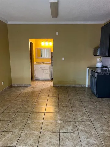 a view of a kitchen with a sink