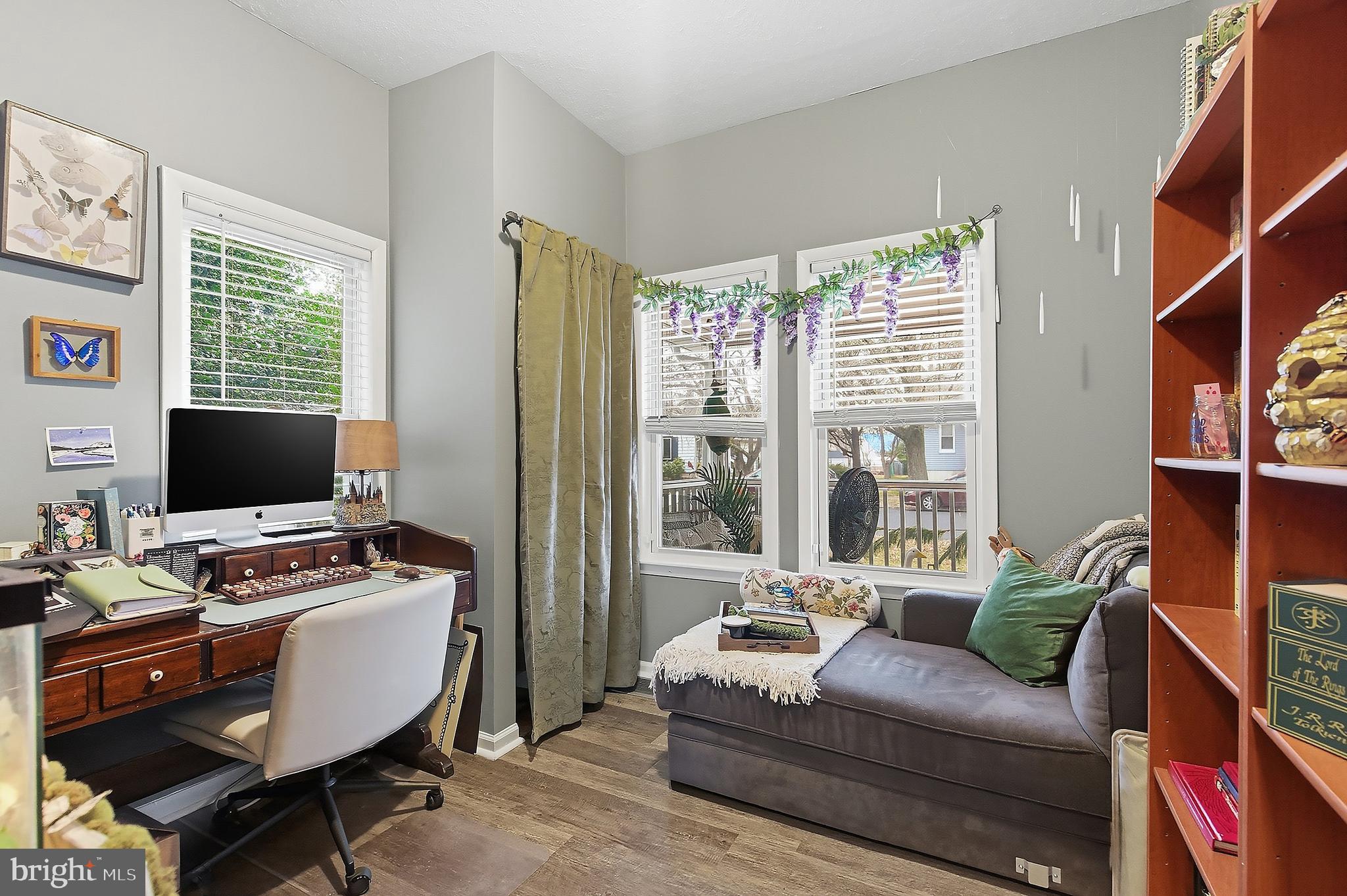 174 Crest Avenue Hamilton, NJ 08690 - Photo 17 of 29 a living room with furniture a flat screen tv and a window