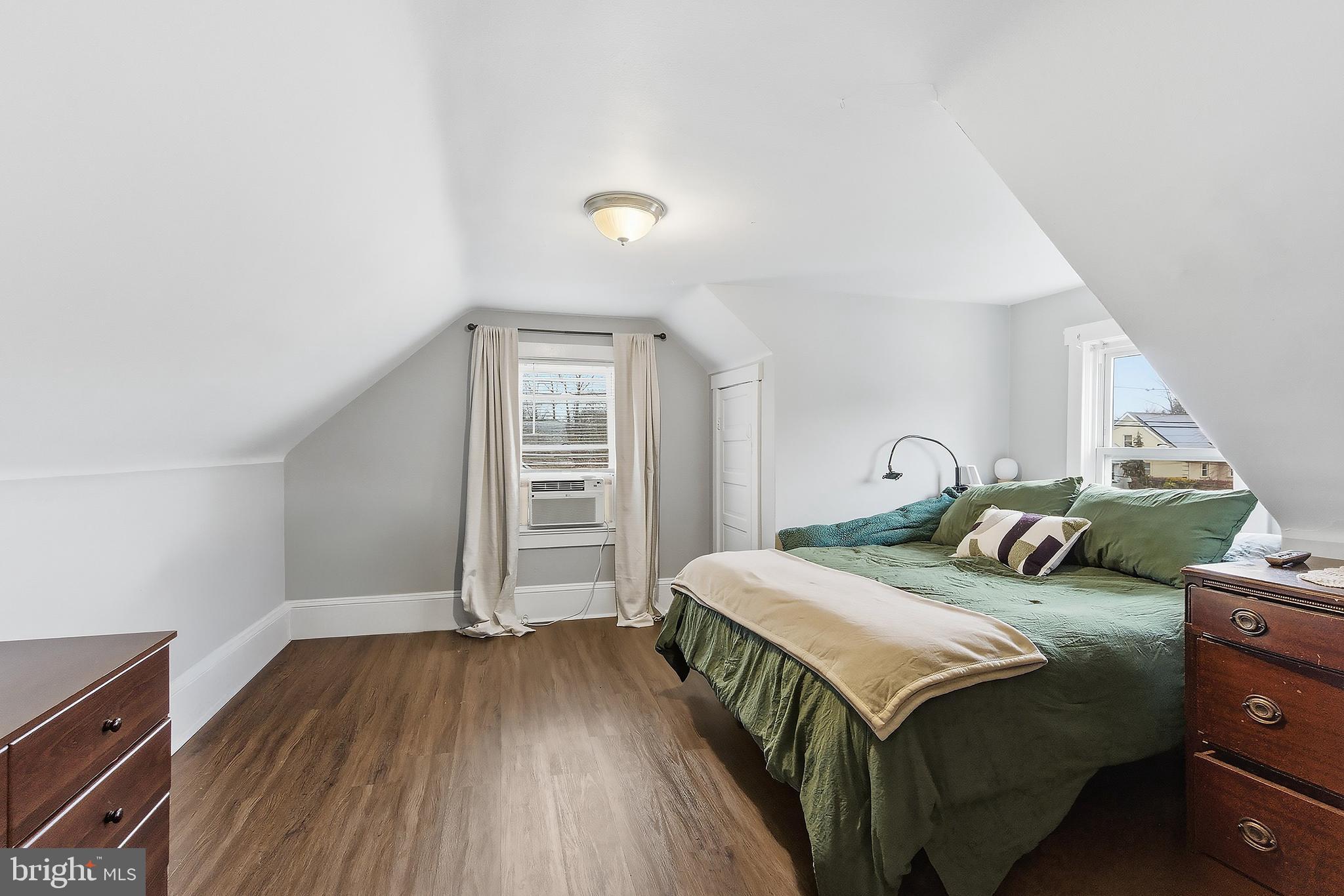 174 Crest Avenue Hamilton, NJ 08690 - Photo 20 of 29 a bedroom with bed and wooden floor