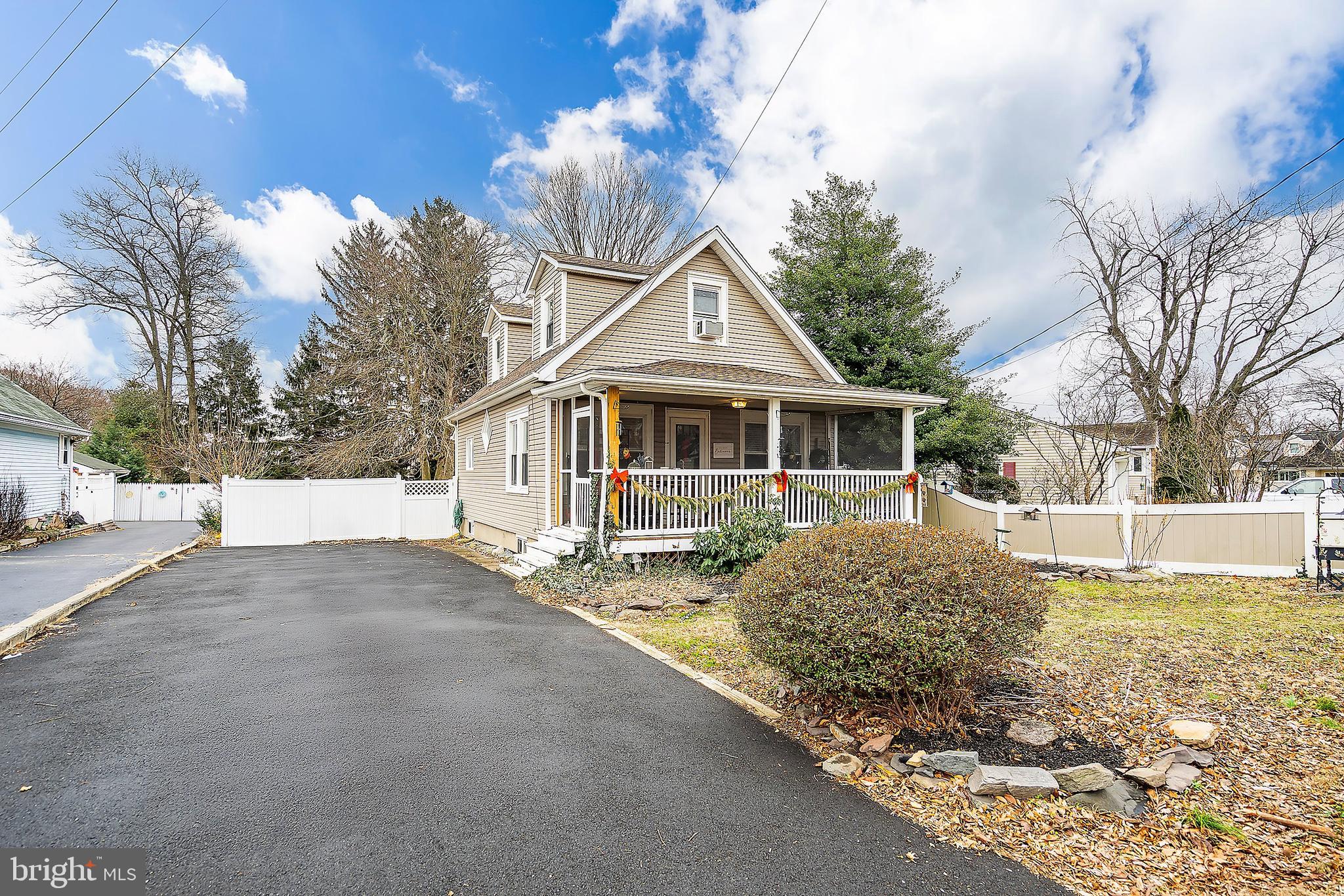 174 Crest Avenue Hamilton, NJ 08690 - Photo 3 of 29 a front view of a house with a yard and garage
