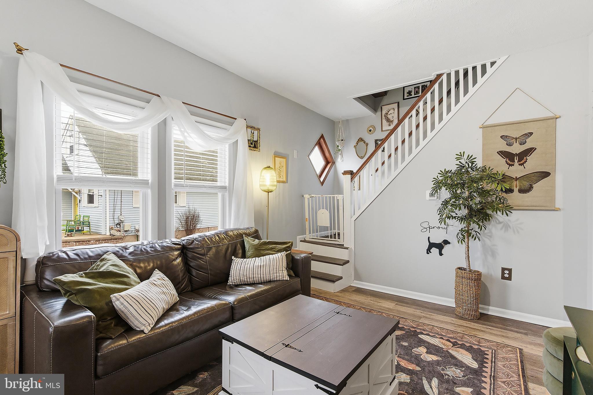 174 Crest Avenue Hamilton, NJ 08690 - Photo 6 of 29 a living room with furniture and a potted plant