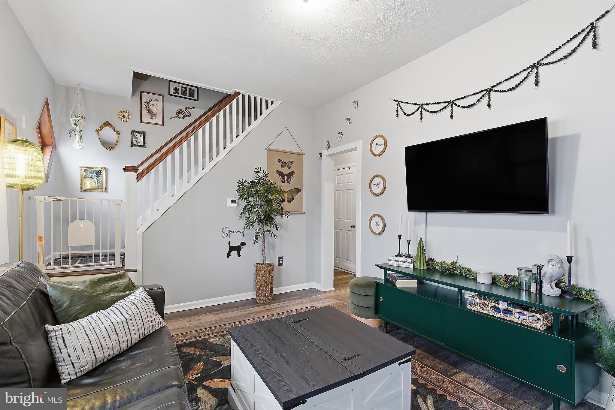 174 Crest Avenue Hamilton, NJ 08690 - Photo 9 of 29 a living room with furniture and a flat screen tv