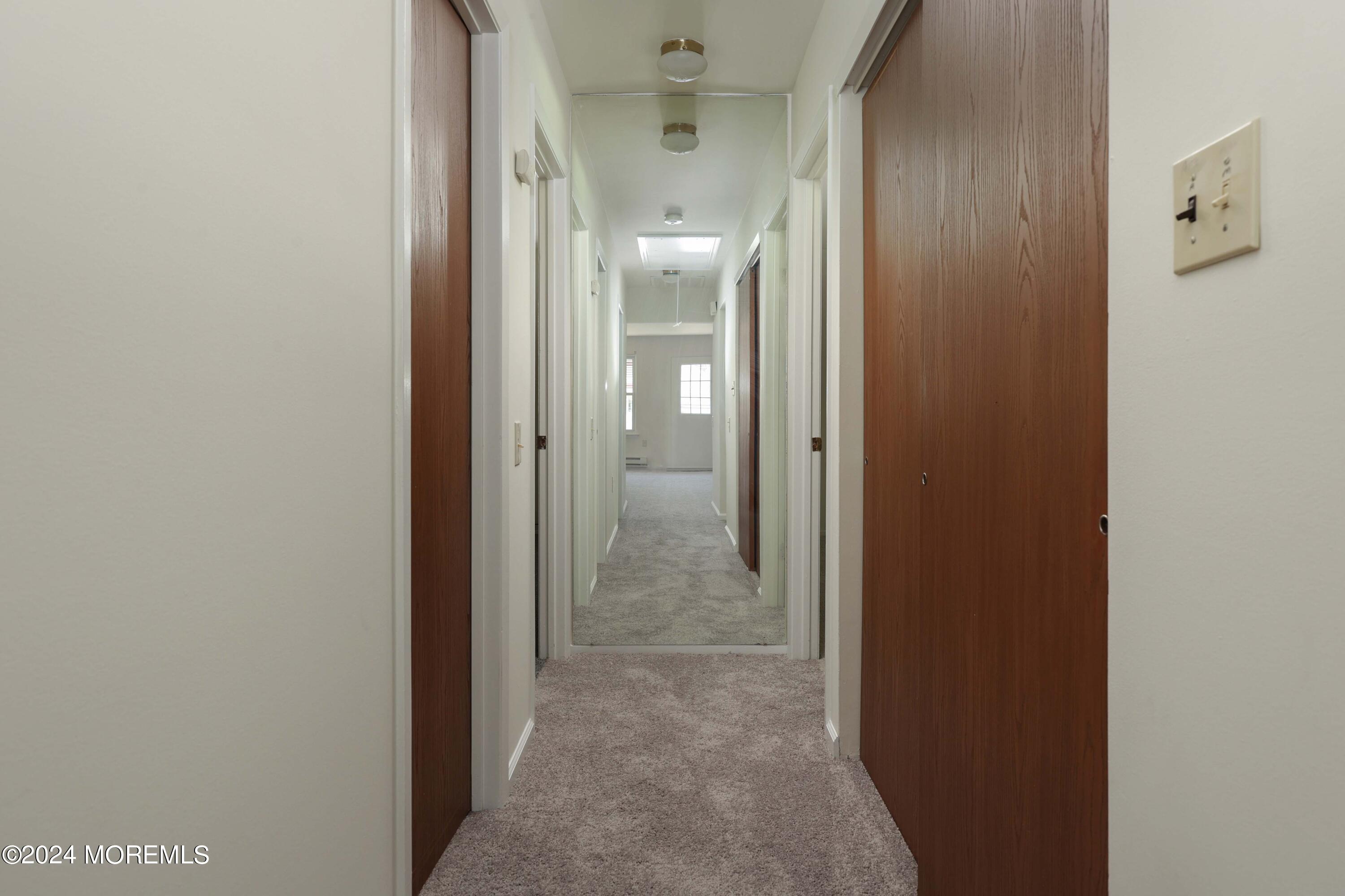 147A Sunset Road, Unit B Whiting, NJ 08759 - Photo 13 of 23 a view of a hallway