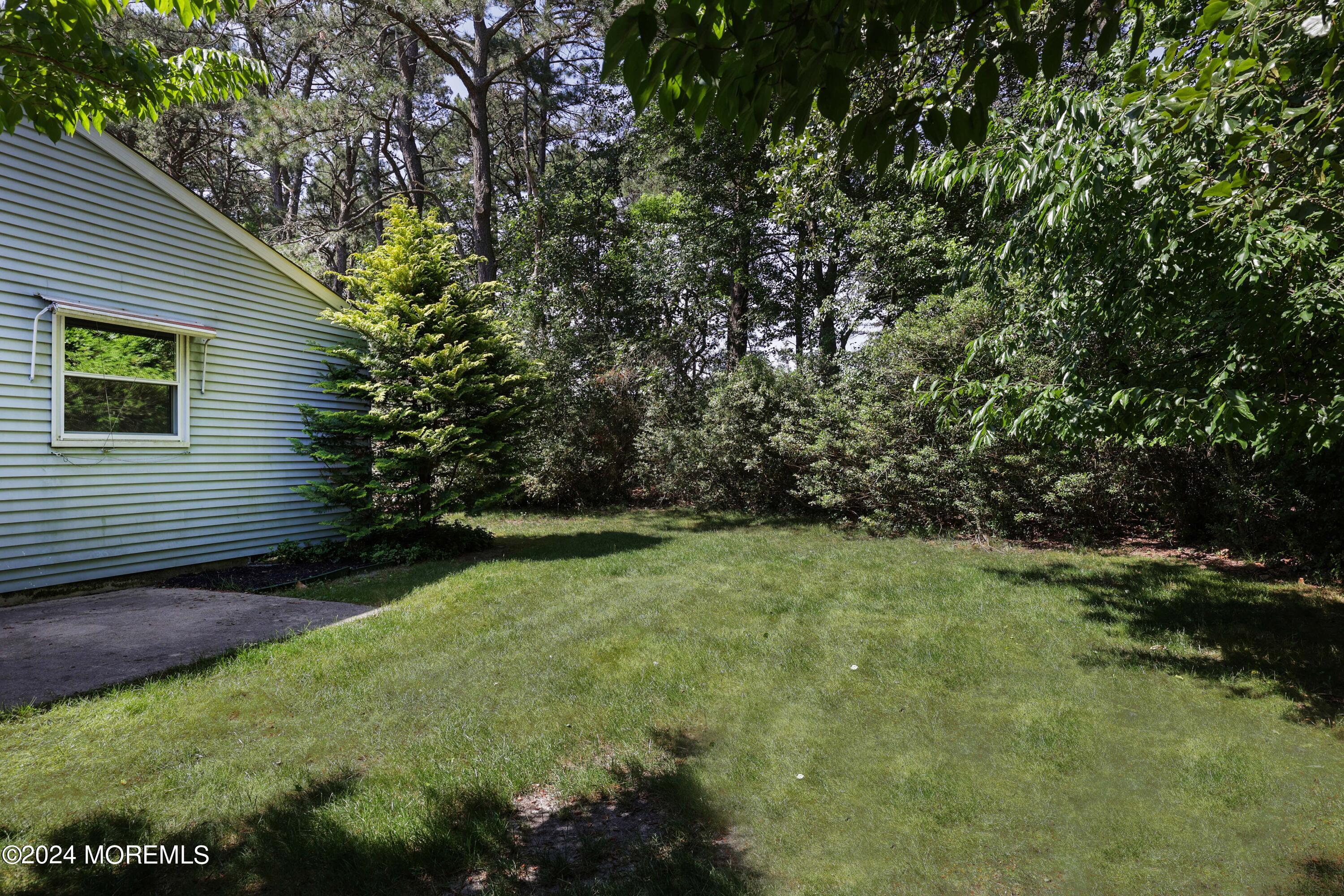 147A Sunset Road, Unit B Whiting, NJ 08759 - Photo 19 of 23 a view of backyard with green space