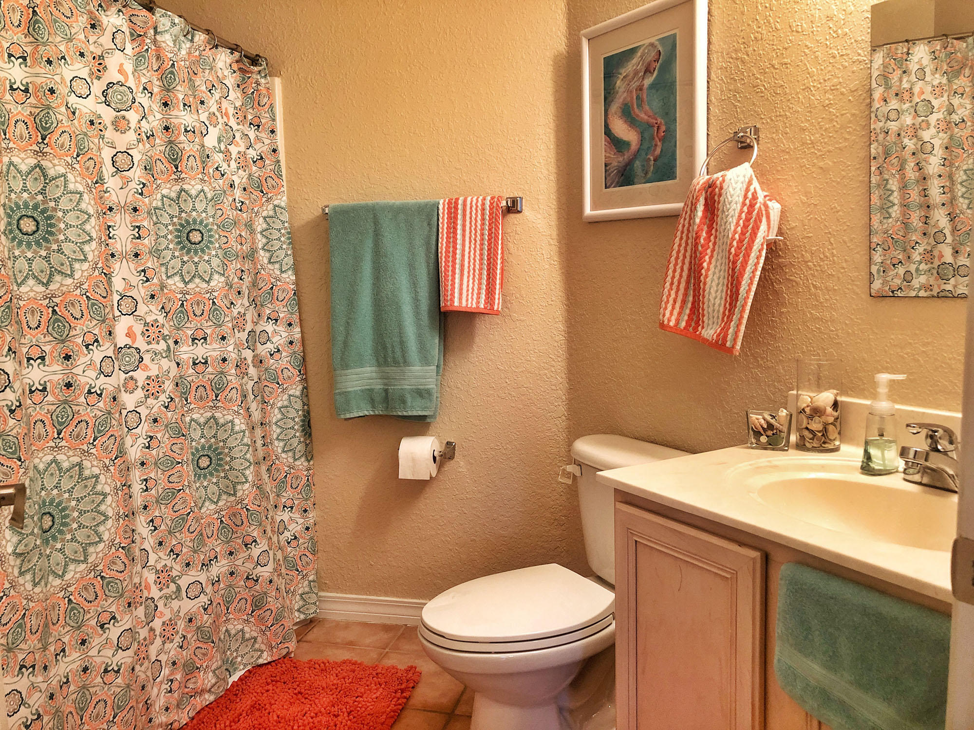 244 Shipwreck Road Santa Rosa Beach, FL 32459 - Photo 38 of 41 a bathroom with a sink toilet and a mirror