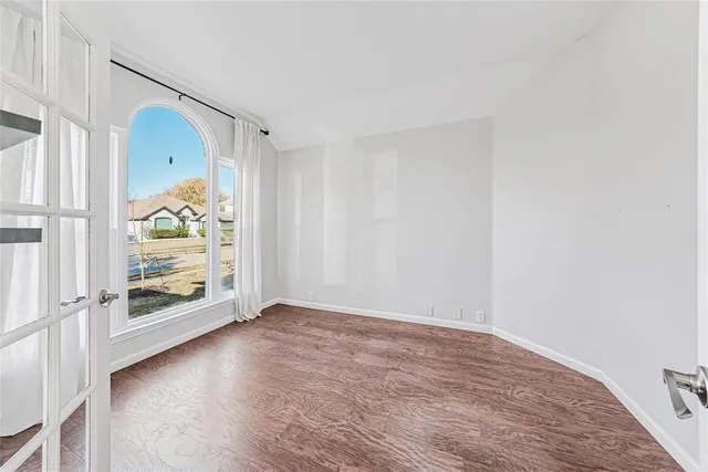 a view of an empty room and window