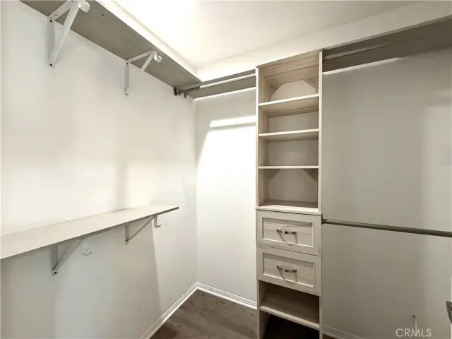 a view of an empty walk in closet