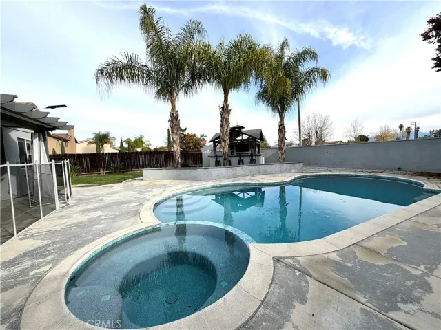a view of outdoor space with swimming pool