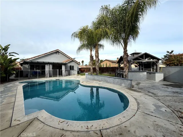 a view of a house with swimming pool