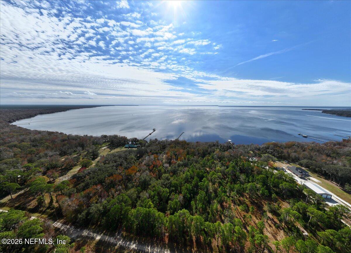 145 Atkins Road Georgetown, FL 32139 - Photo 2 of 9 a view of a lake with a mountain
