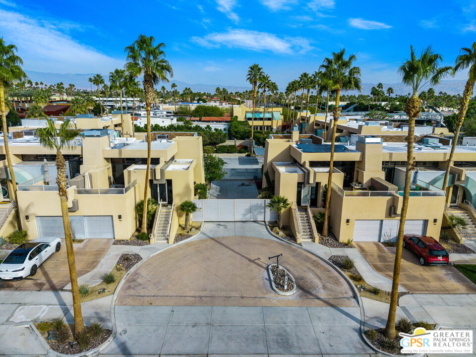 100 East Stevens Road, Unit 513 Palm Springs, CA 92262 - Photo 26 of 26 a view of a swimming pool with outdoor seating