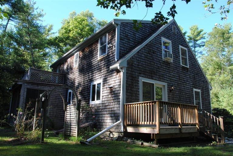 16 Union Church Terrace Rochester, MA 02770 - Photo 16 of 17 a front view of a house with a garden