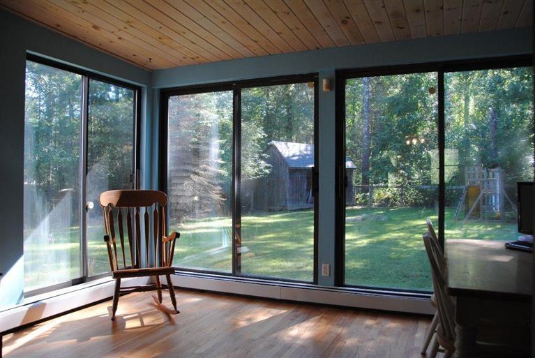 16 Union Church Terrace Rochester, MA 02770 - Photo 9 of 17 a view of a porch with furniture and wooden floor
