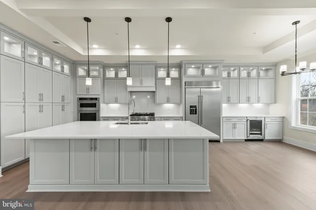 a view of an empty room with stairs and ventilation