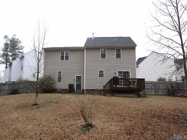 8300 Neuse Rapids Road Raleigh, NC 27616 - Photo 12 of 12 Deck has Grill w/Natural Gas Hookup. Garage has Access Door to Yard. Workbench & Cabinets for Storage.