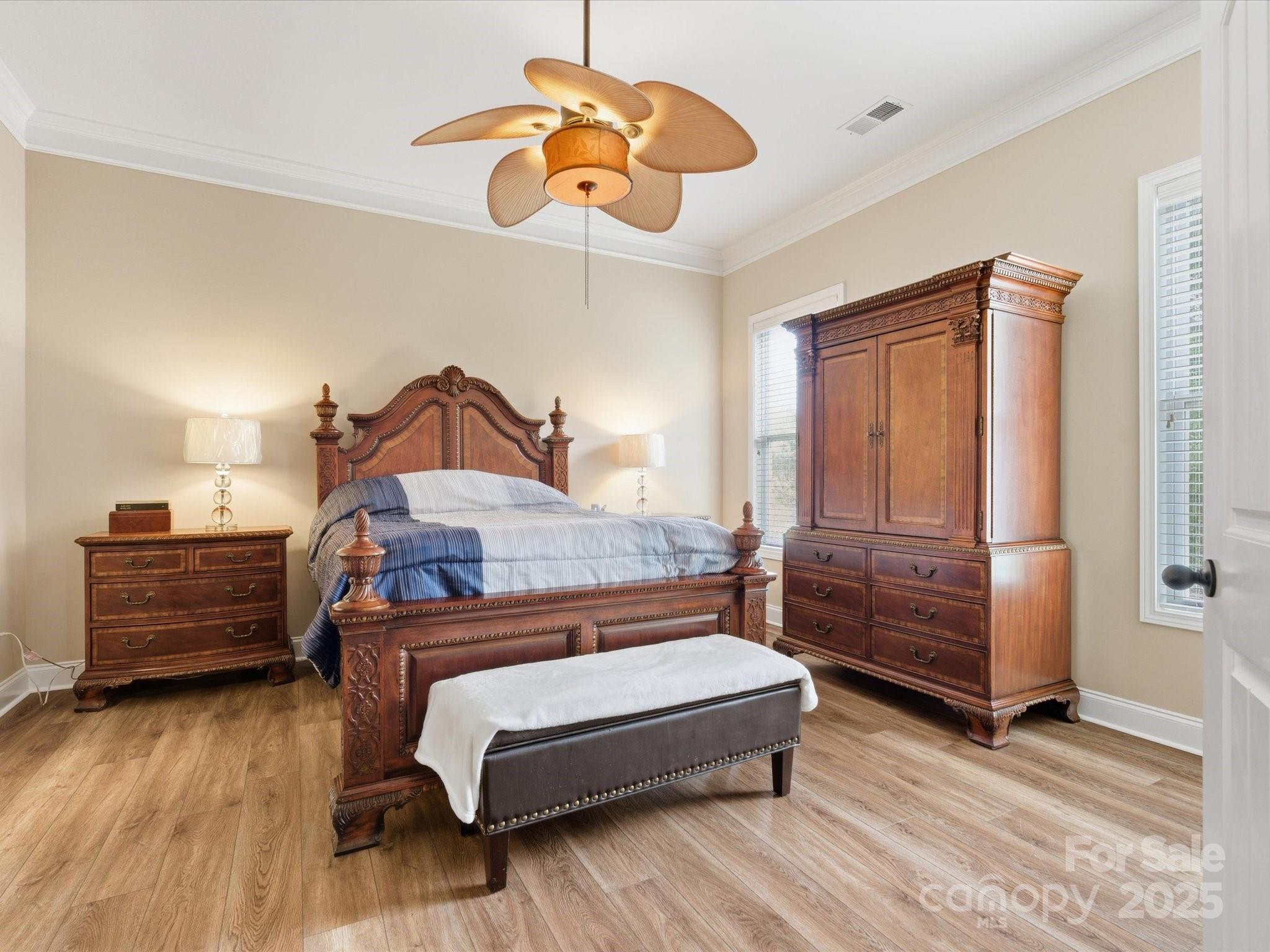1326 Tupelo Road Clover, SC 29710 - Photo 16 of 40 a bedroom with a bed and wooden floor