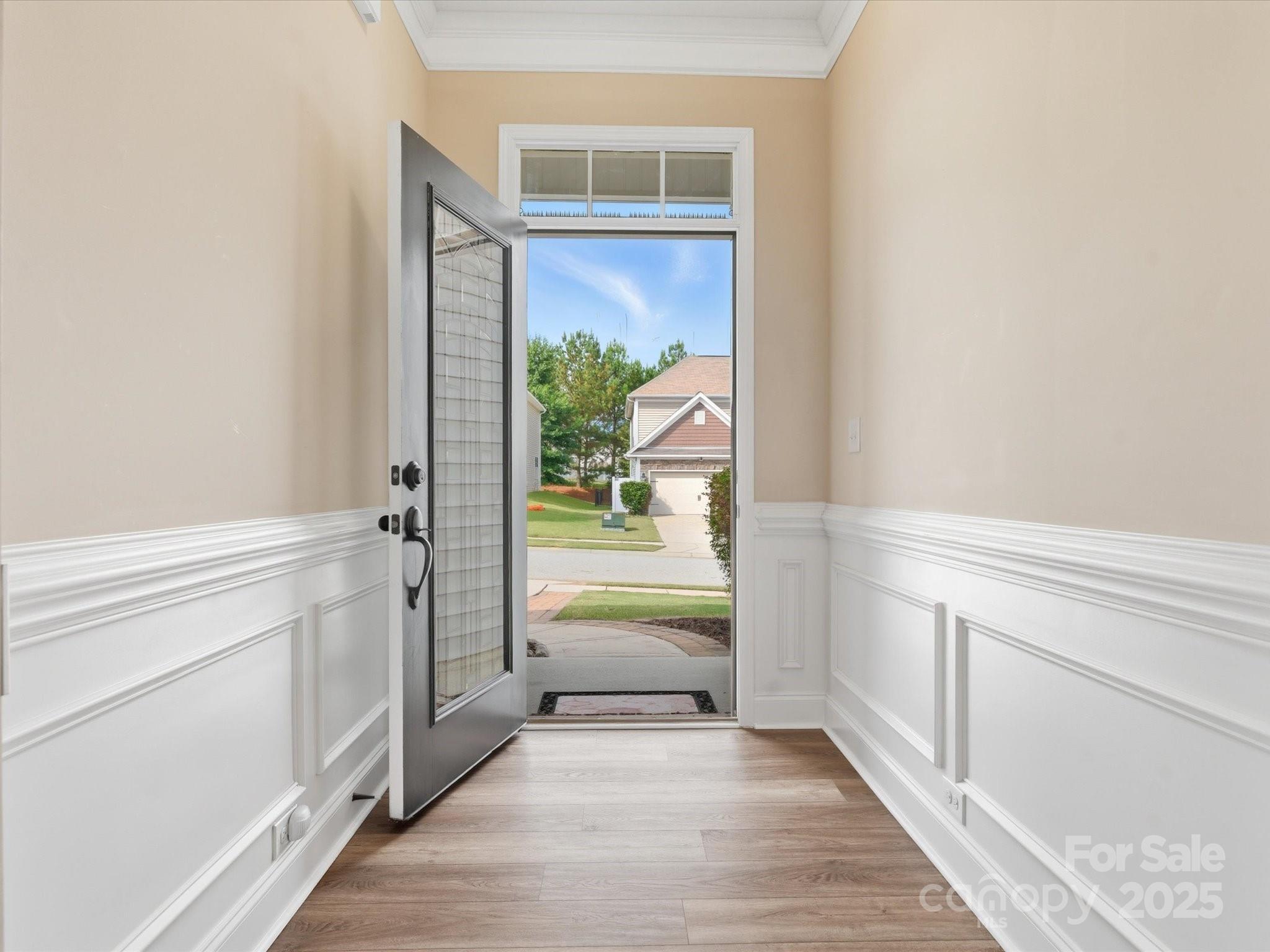 1326 Tupelo Road Clover, SC 29710 - Photo 2 of 40 a view of a hallway view with wooden floor and staircase