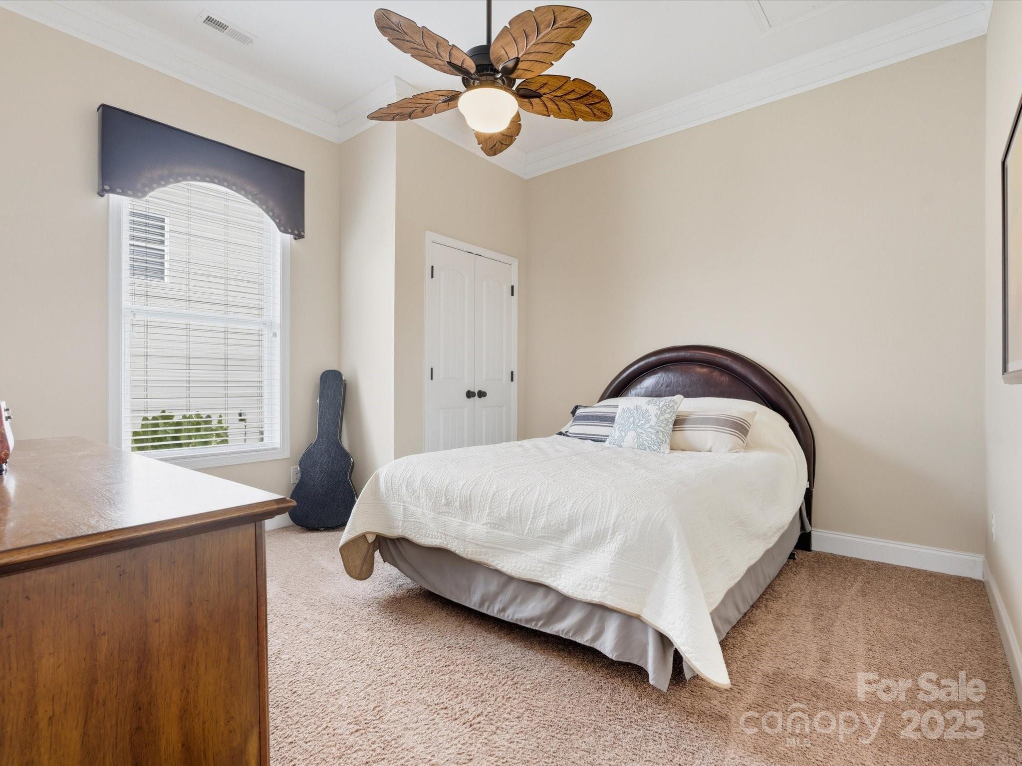 1326 Tupelo Road Clover, SC 29710 - Photo 22 of 40 a spacious bedroom with a bed and a window