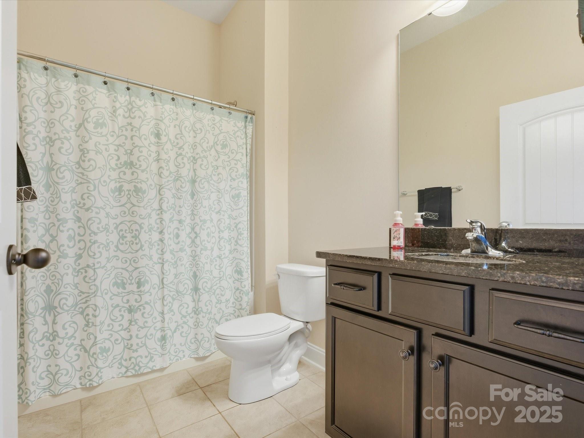 1326 Tupelo Road Clover, SC 29710 - Photo 23 of 40 a view of bathroom with a sink and toilet