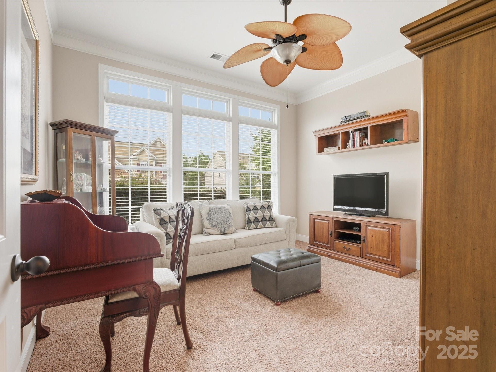 1326 Tupelo Road Clover, SC 29710 - Photo 24 of 40 a living room with furniture and a flat screen tv
