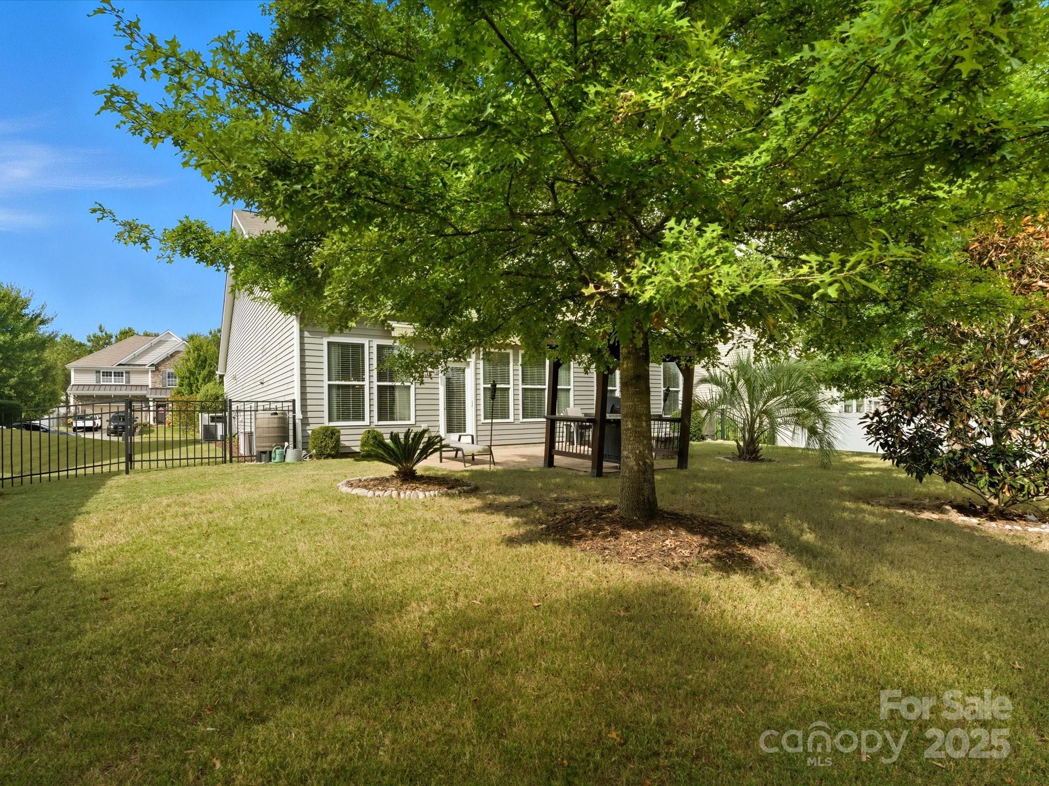 1326 Tupelo Road Clover, SC 29710 - Photo 28 of 40 a view of yard with swimming pool and trees