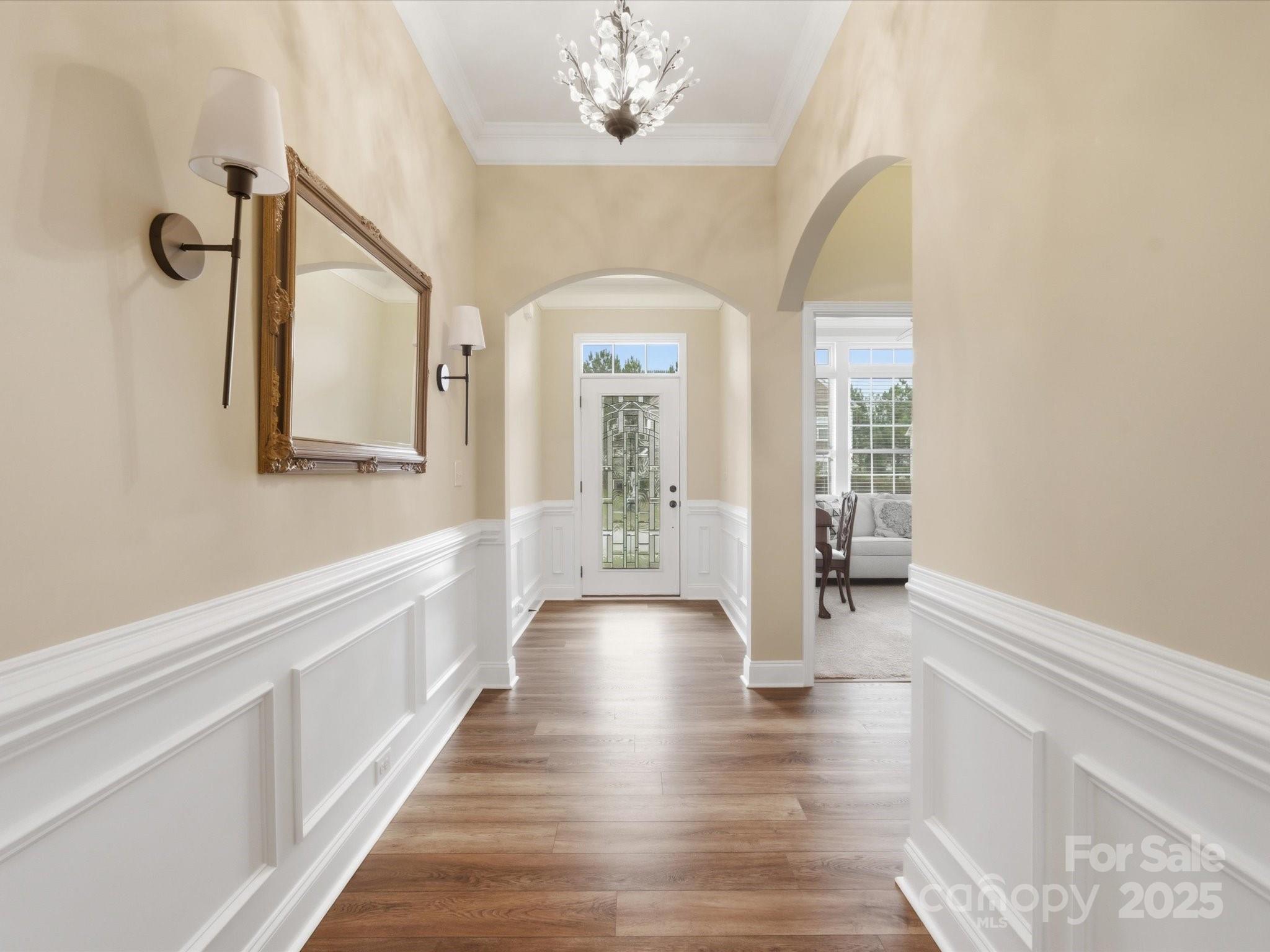 1326 Tupelo Road Clover, SC 29710 - Photo 3 of 40 a view of a hallway with wooden floor and staircase