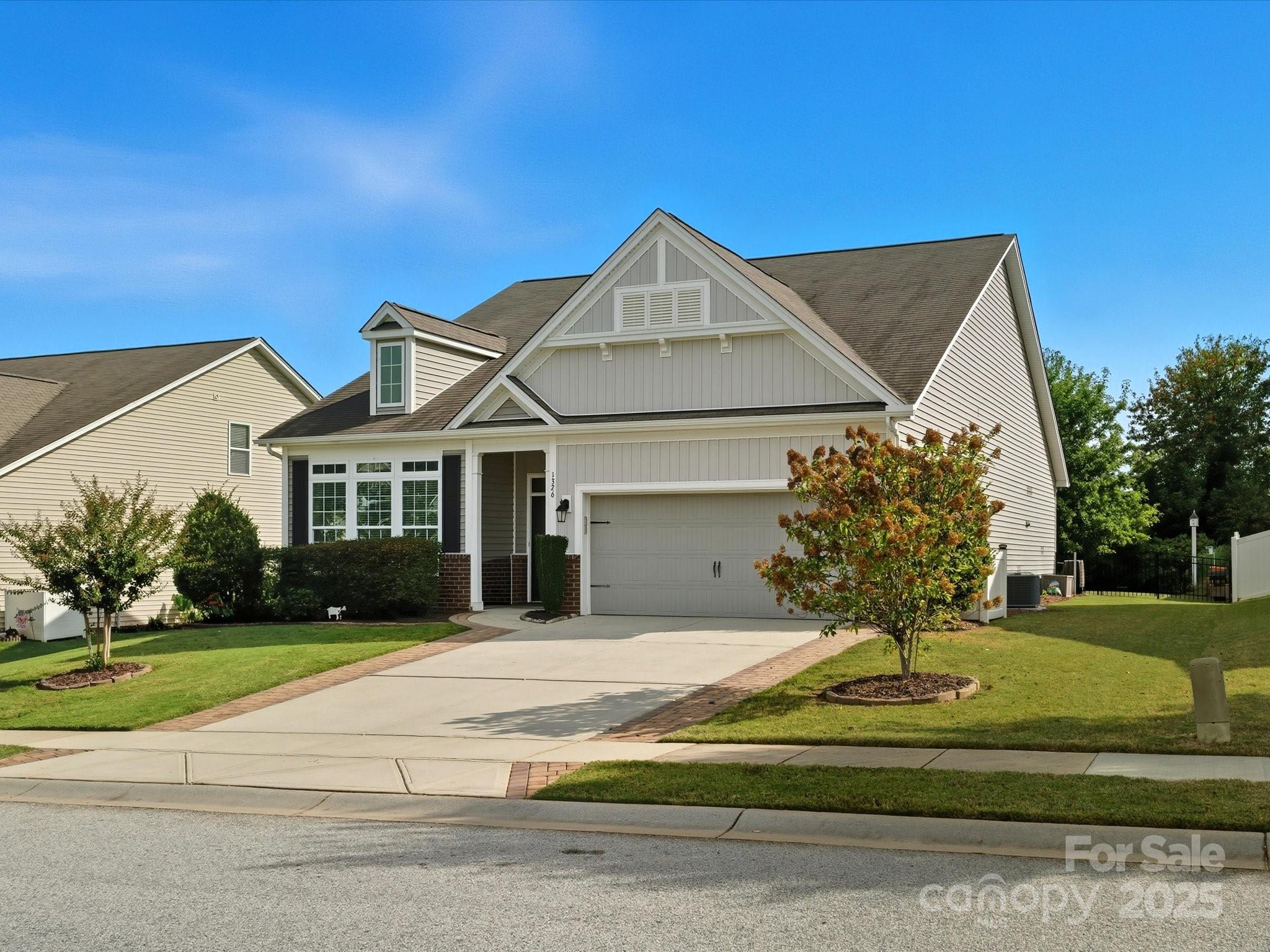 1326 Tupelo Road Clover, SC 29710 - Photo 34 of 40 a front view of a house with a yard
