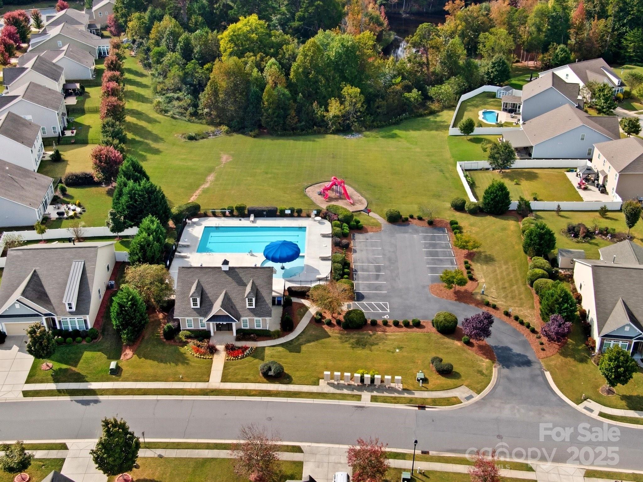 1326 Tupelo Road Clover, SC 29710 - Photo 35 of 40 an aerial view of a house with a swimming pool and outdoor seating