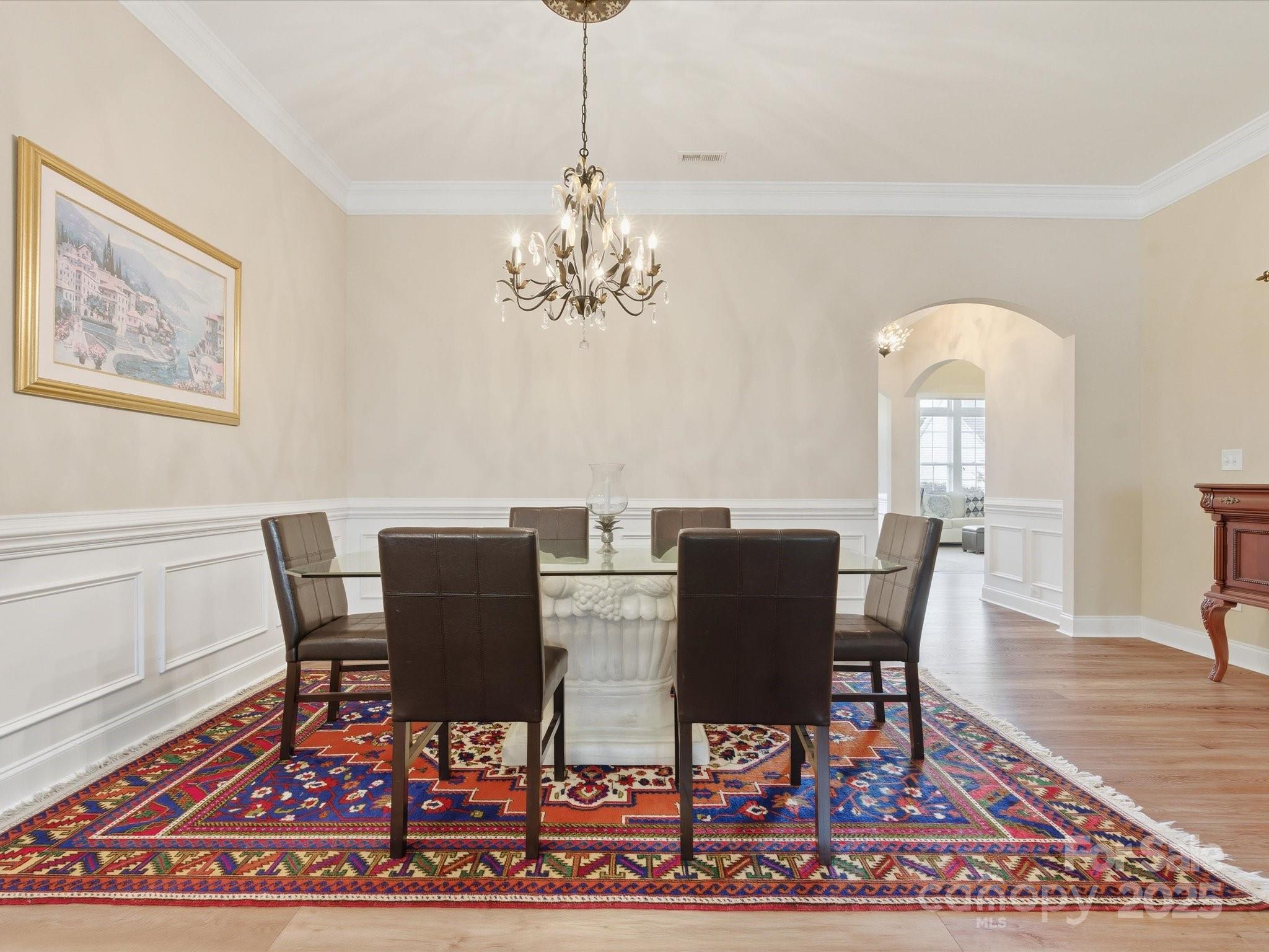 1326 Tupelo Road Clover, SC 29710 - Photo 4 of 40 a view of a dining room with furniture a rug and wooden floor
