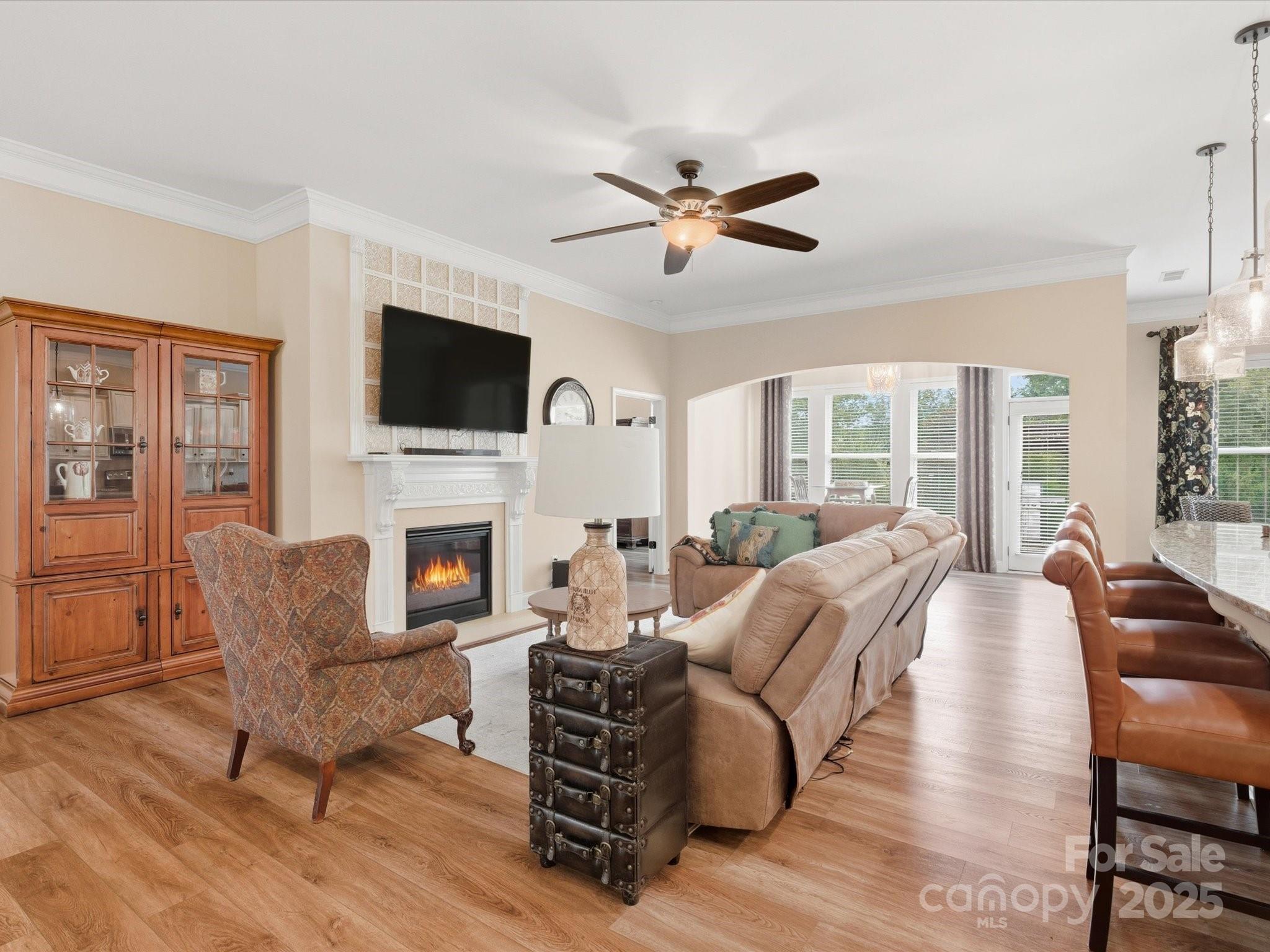1326 Tupelo Road Clover, SC 29710 - Photo 8 of 40 a living room with furniture a flat screen tv and a fireplace