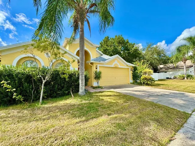 a view of a house with a swimming pool