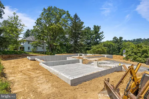 a view of swimming pool with a patio