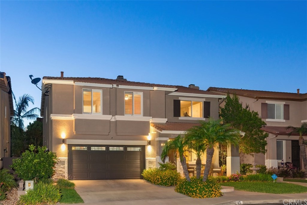 25 Ammolite Rancho Santa Margarita, CA 92688 - Photo 1 of 1 a front view of a house with a yard