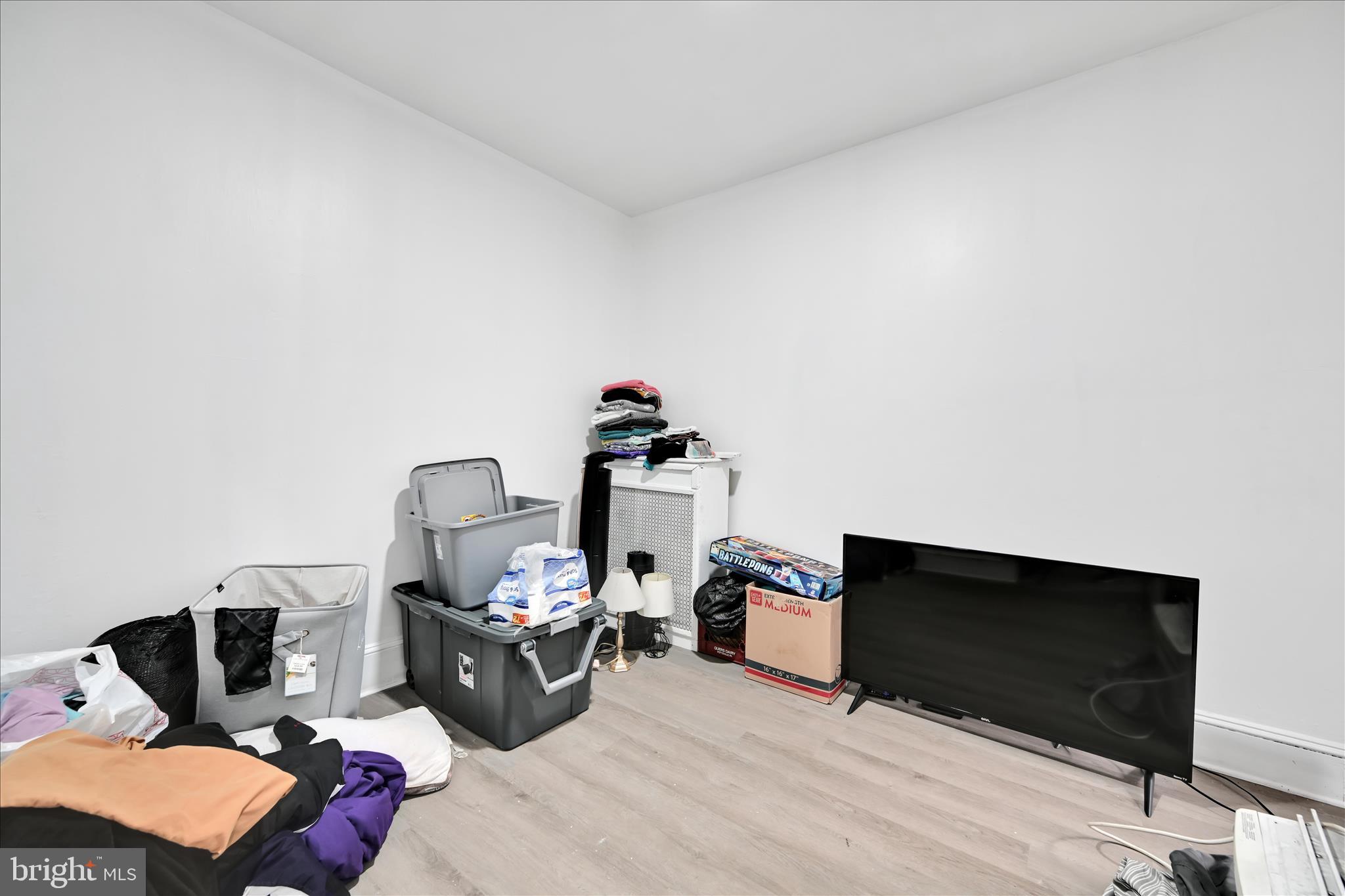 535 East Centre Street Mahanoy City, PA 17948 - Photo 13 of 26 a bedroom with furniture and a flat screen tv