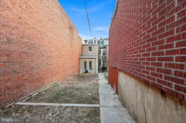 a front view of a house with stairs