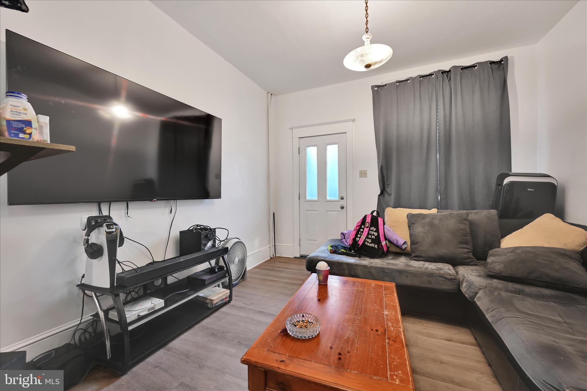 535 East Centre Street Mahanoy City, PA 17948 - Photo 5 of 26 a living room with furniture and a flat screen tv