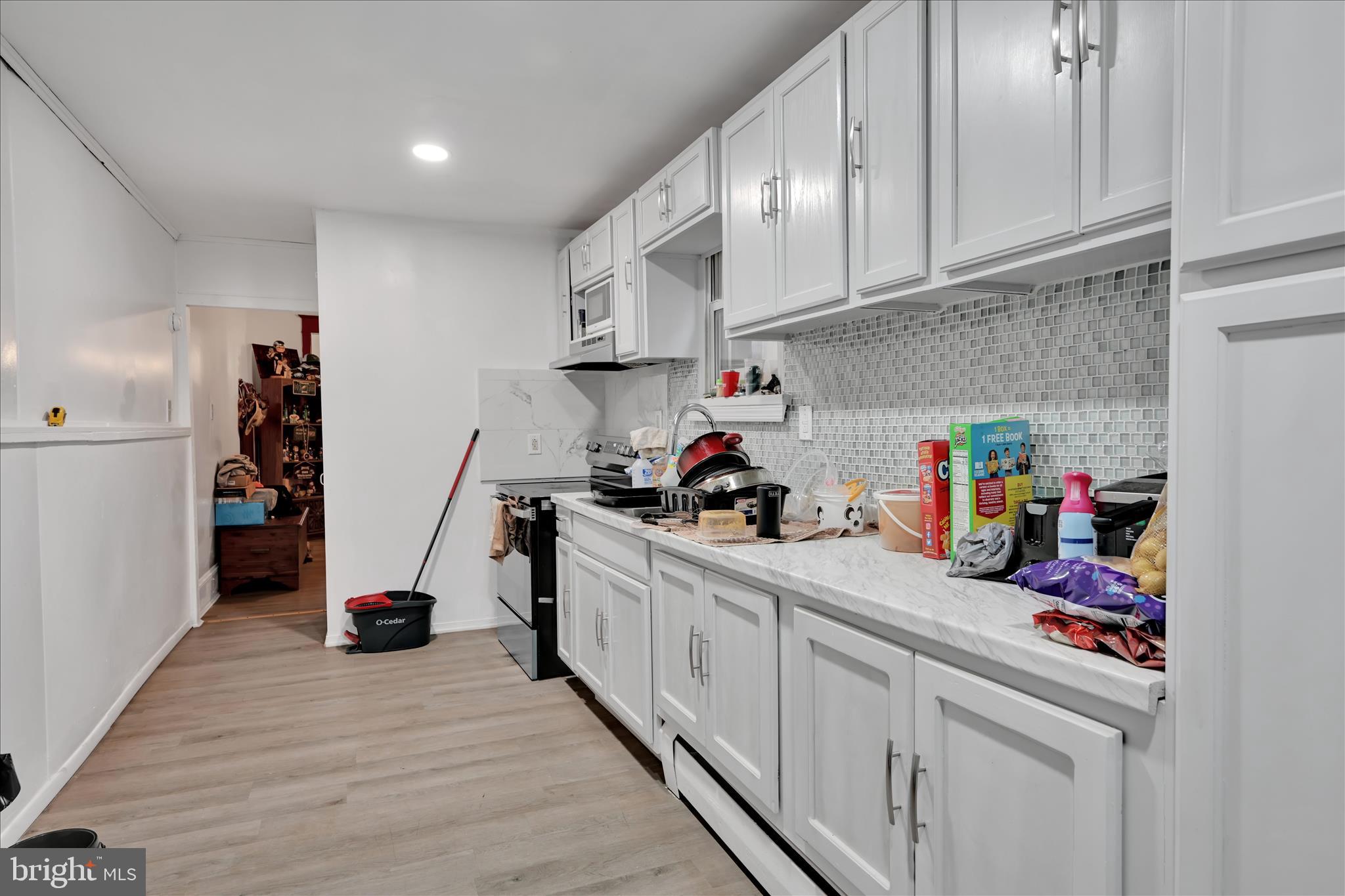 535 East Centre Street Mahanoy City, PA 17948 - Photo 10 of 26 a kitchen with white cabinets and appliances