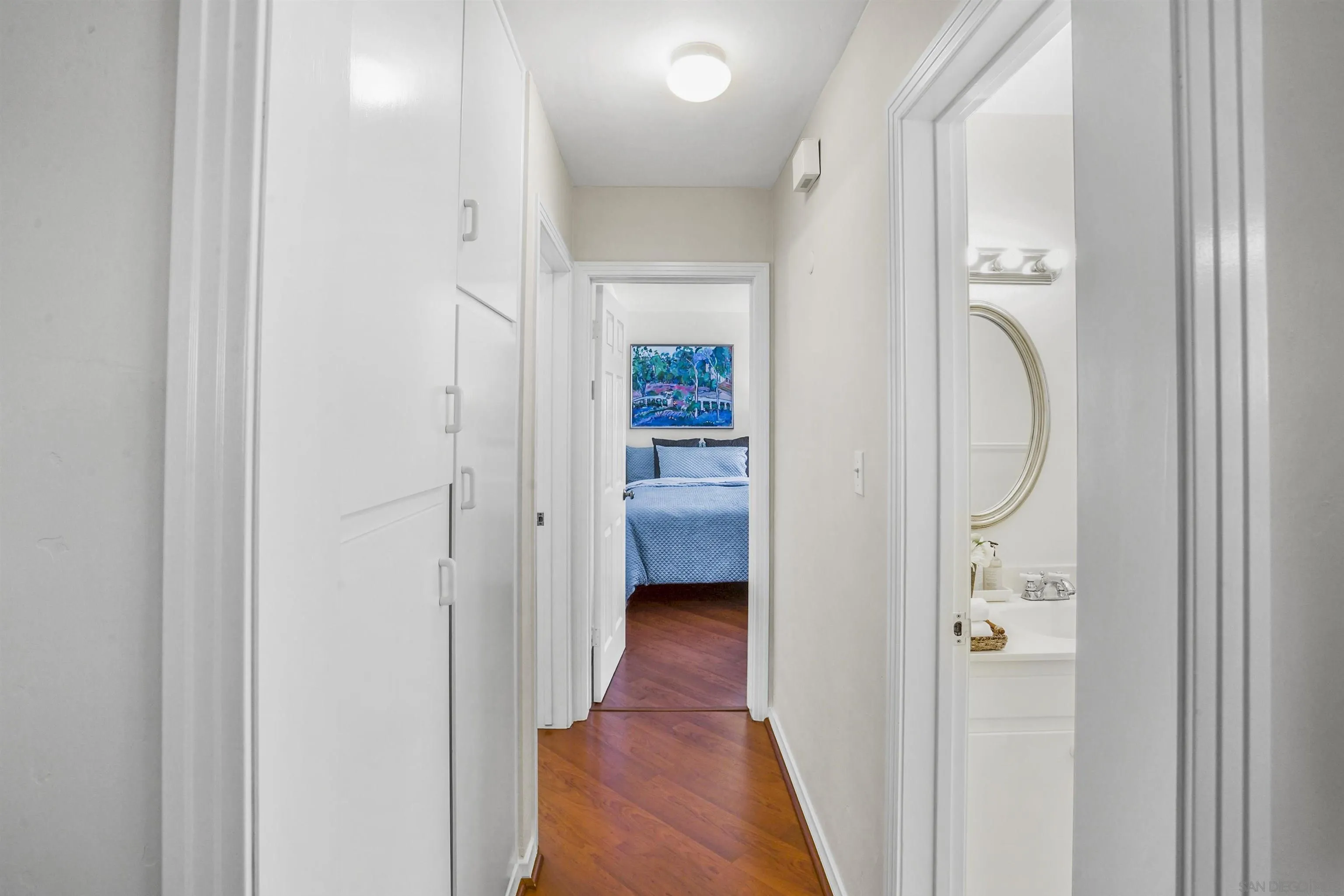 734 E Avenue Coronado, CA 92118 - Photo 12 of 30 a view of a hallway with wooden floor