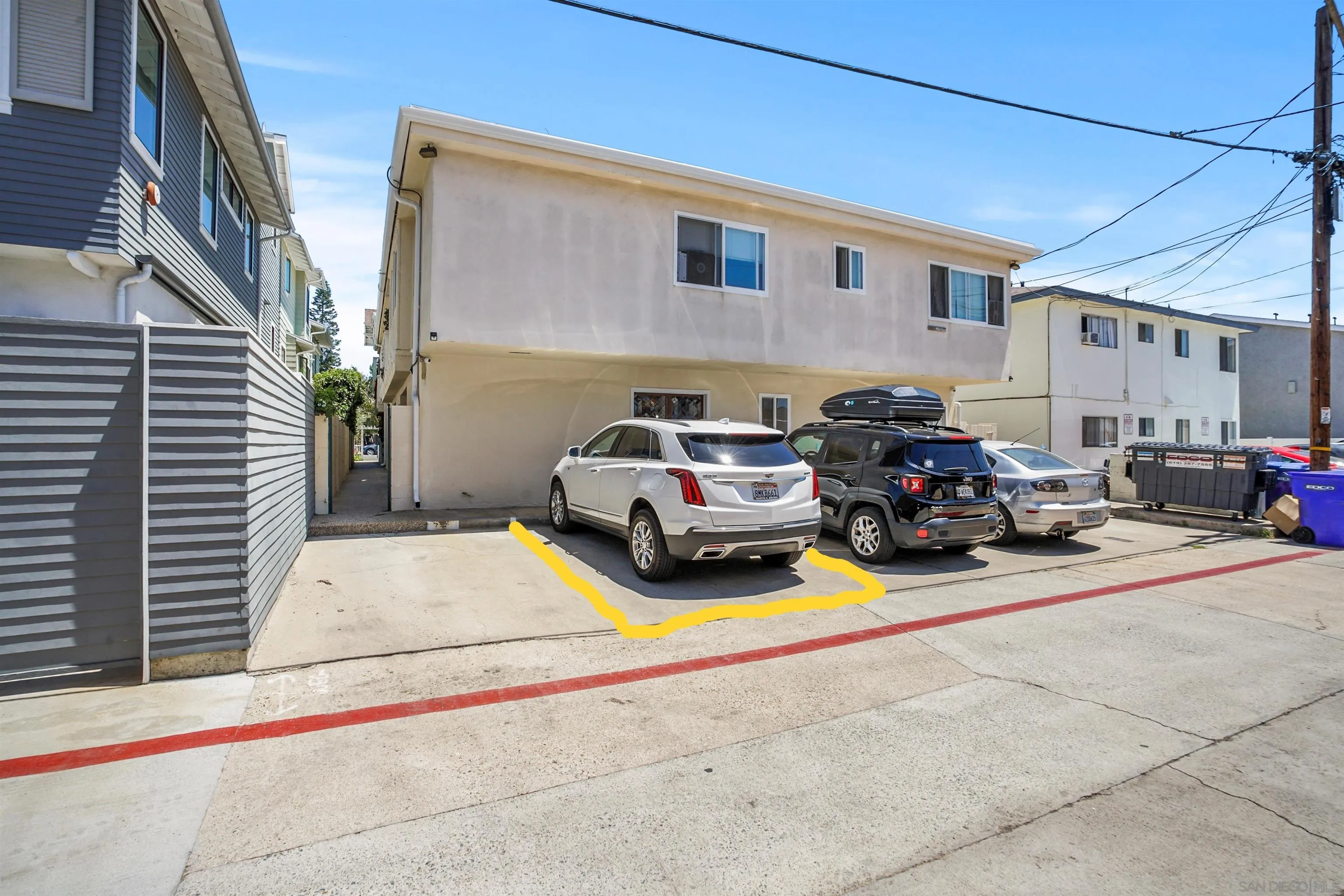 734 E Avenue Coronado, CA 92118 - Photo 27 of 30 a car parked in front of a house